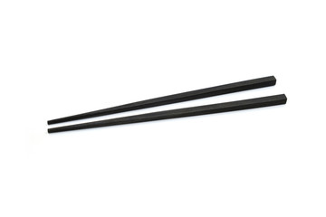 black chopsticks on white background