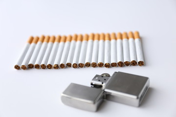 Close up of a smoking cigarettes . cigarette filter tubes