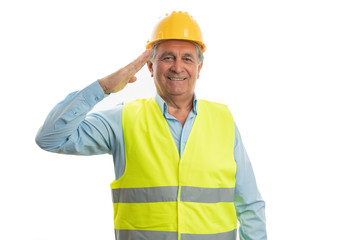 Construction worker touching forehead with hand