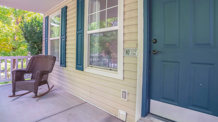 Panorama frame Comfortable rocking chair on a covered porch