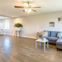 Square Living room with small end table and couch