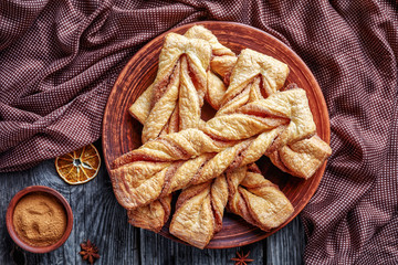Cinnamon puff pastry twists on a plate