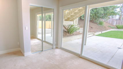 Panorama frame Empty bedroom with sliding glass doors
