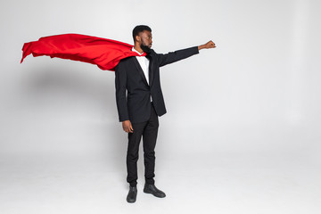 Young african businessman hero run with fist up isolated on white background