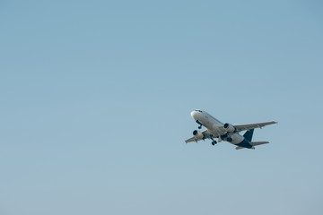 Flight departure of jet plane in clear sky