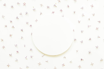 Creative layout of lilac flowers with space for text on white paper. Mockup. View from above. - Image