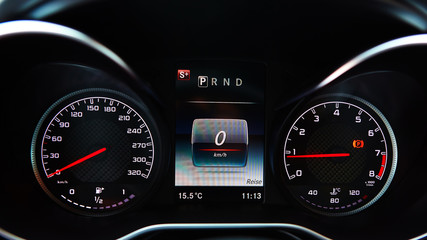 Naklejka premium Modern car speedometer. Close up shot of the dashboard