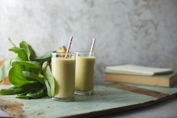 Healthy green smoothie and ingredients..