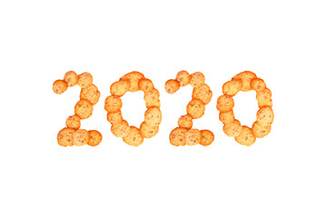 New year concept. 2020 inscription made of homemade cookies with candied fruit. 2020 lettering made of gingerbread isolated white background