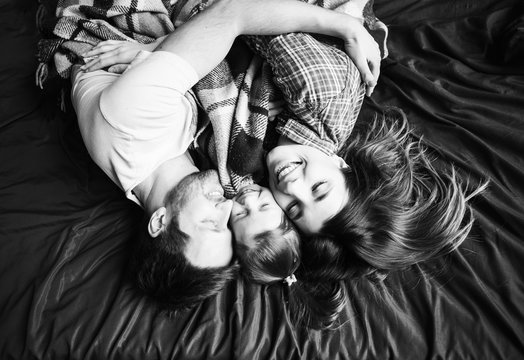 Young Family Having Fun. Together at Home.