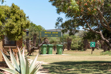 Swellendam, Western Cape, South Africa. December 2019. Recyling bins for plastic, tin and glass on...