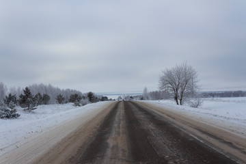 Obraz na płótnie Canvas Winter rural road in the Ulyanovsk region in Russia.