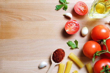 Clean healthy eating habits concept. Uncooked pasta, greens & vegetables mix and other vegan macaroni ingredients, white background. Vegetarian diet food. Flat lay, copy space