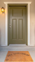 Vertical frame Hey good looking words on the brown doormat by the front door of a home