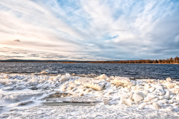 Fototapeta na wymiar Ice braking up on a river Kemijoki in the North Finland