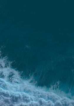 Aerial view to sea landscape, sea water with waves. Dramatic colors photo. Image with place for text.