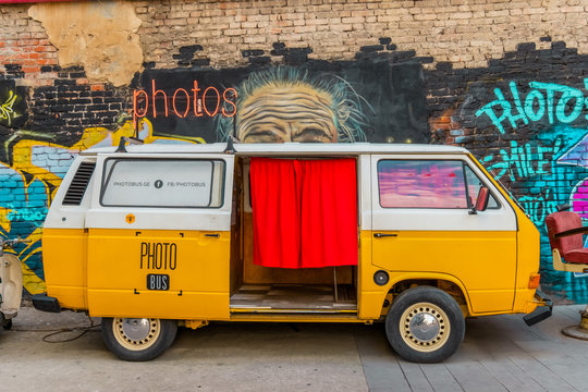 Tbilisi, Georgia, 16 December 2019 - retro bus using as a photo booth  in Fabrika modern public place