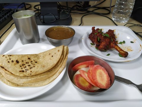 Typical chicken thali provided by the office canteen staff.