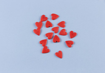 Red hearts in the center of a blue background