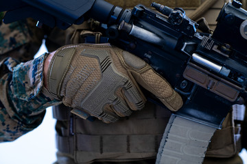 soldier preparing gear for action