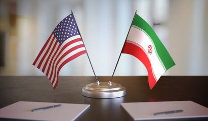 USA and Mexican flags on table. Negotiation between Mexico and United States. 3D rendered illustration. © vchalup
