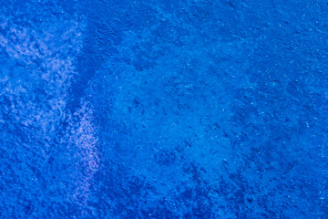 texture of blue decorative plaster background or concrete paint wall , abstract grain stucco backgroung for wallpaper design