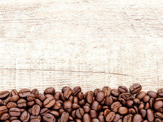 Coffee on wooden background.