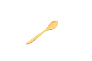 wooden spoon isolated over a white background.