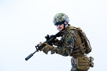 Fototapeta premium soldier in action aiming laseer sight optics