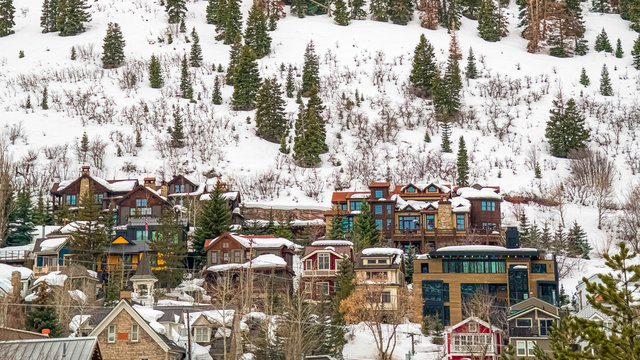 Pano frame Snowy winter view in Park City Utah with buildings and houses on a mountain