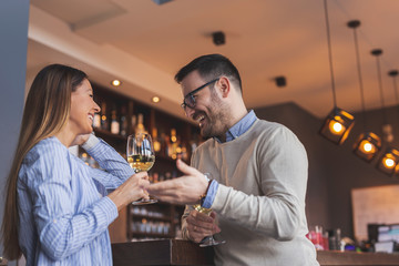Couple drinking wine and having a conversation
