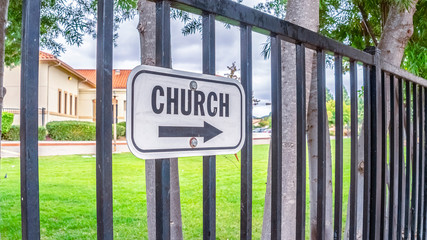 Panorama frame Church sign with arrow outdoors on a sunny day
