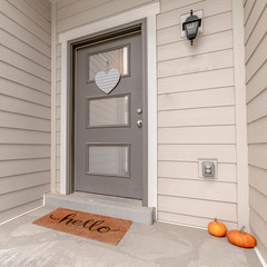 Square frame Clean white entrance to an urban houses