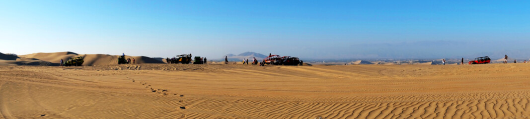 Desert and people in Huacachina Peru