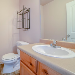 Square Interior of a bathroom with toilet and sink