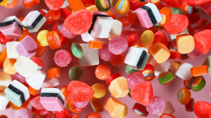 Flying sweet candies up in the air