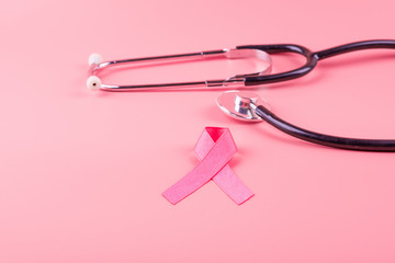 Breast Cancer Awareness, Pink Ribbon with Stethoscope for supporting people living and illness. Woman Healthcare and World cancer day concept