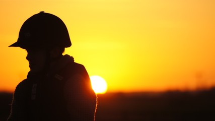 Fototapeta premium Sunset horse riding silhouette Lincolnshire 