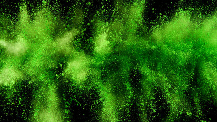 Explosion of green powder isolated on black background