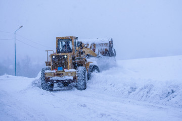 tractor in the snow