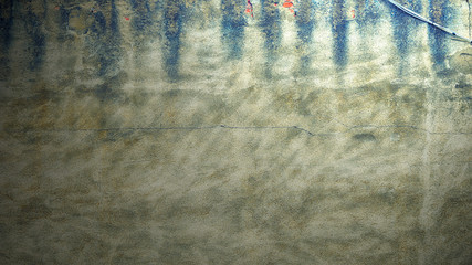 wall with a rough bumpy texture gray with blue smudges