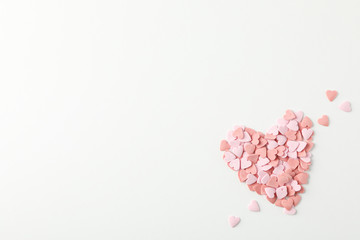 Heart made of decorative hearts on white background, space for text