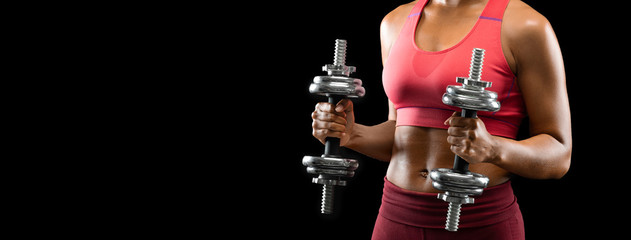 Cropped of sporty woman exercising with barbells
