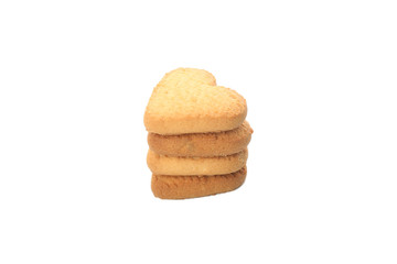 Pile of heart shaped cookies isolated on white background