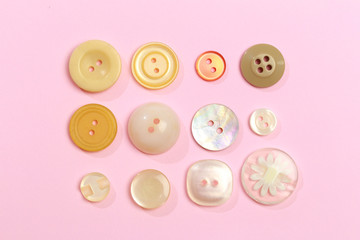 collection of vintage cloth button on colored background  - Image