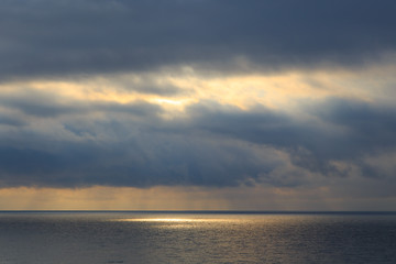 Bright cumulus clouds against the blue sky. Sunset sky Natural background. seascape