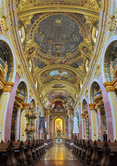 Fototapeta na wymiar Vertical panorama of interior of Jesuit Church in Vienna, Austria. Also known as the University Church, it was built in 1623-1627 and was remodeled by Andrea Pozzo in 1703-1705.
