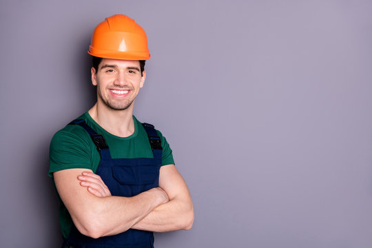 Close-up portrait of his he nice attractive cheerful cheery content guy repairer craftsman folded arms isolated over gray violet purple pastel color background