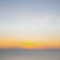 Abstract background - Blurred horizon at sunset over the sea