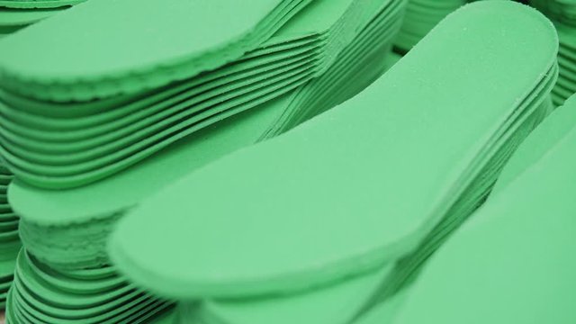 Ready made shoe insoles are ready for their further use in production at the shoe factory.